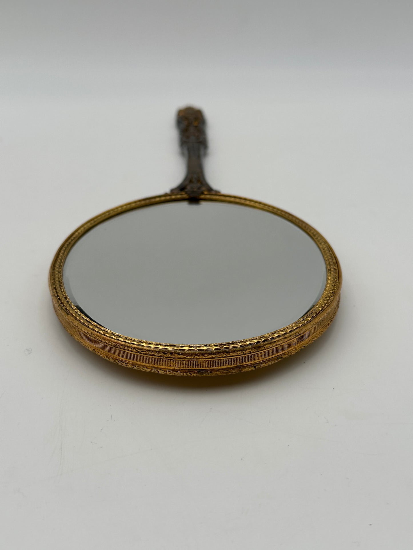 Brass Tone Vintage Hand-Held Beveled Edge Oval Vanity Mirror